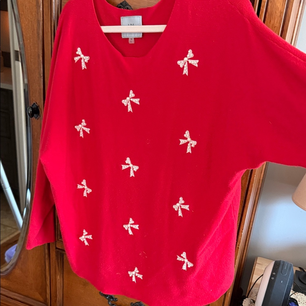 Elegant Red V-Neck Sweater with Bow Details